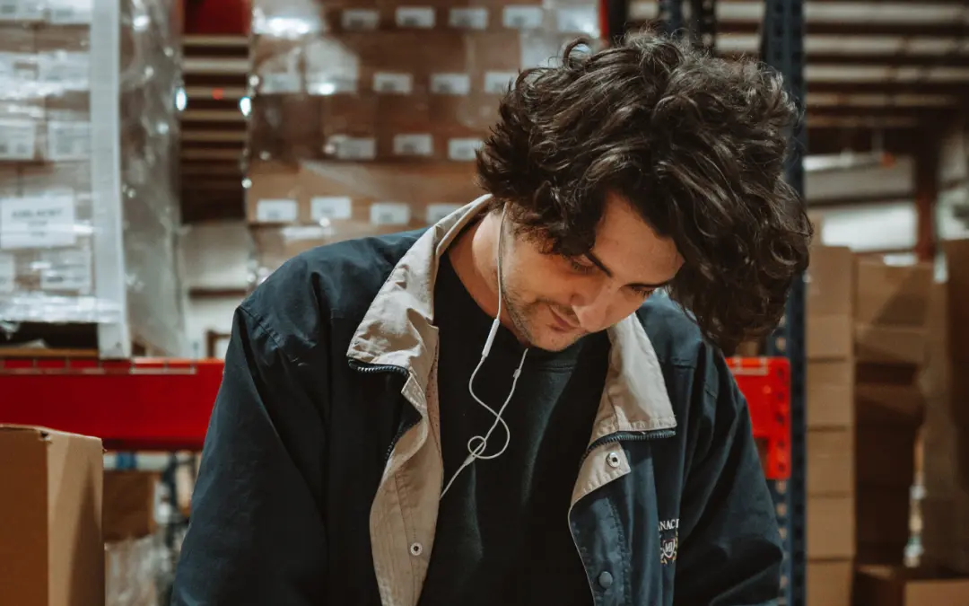 close-up of gentleman working in warehouse