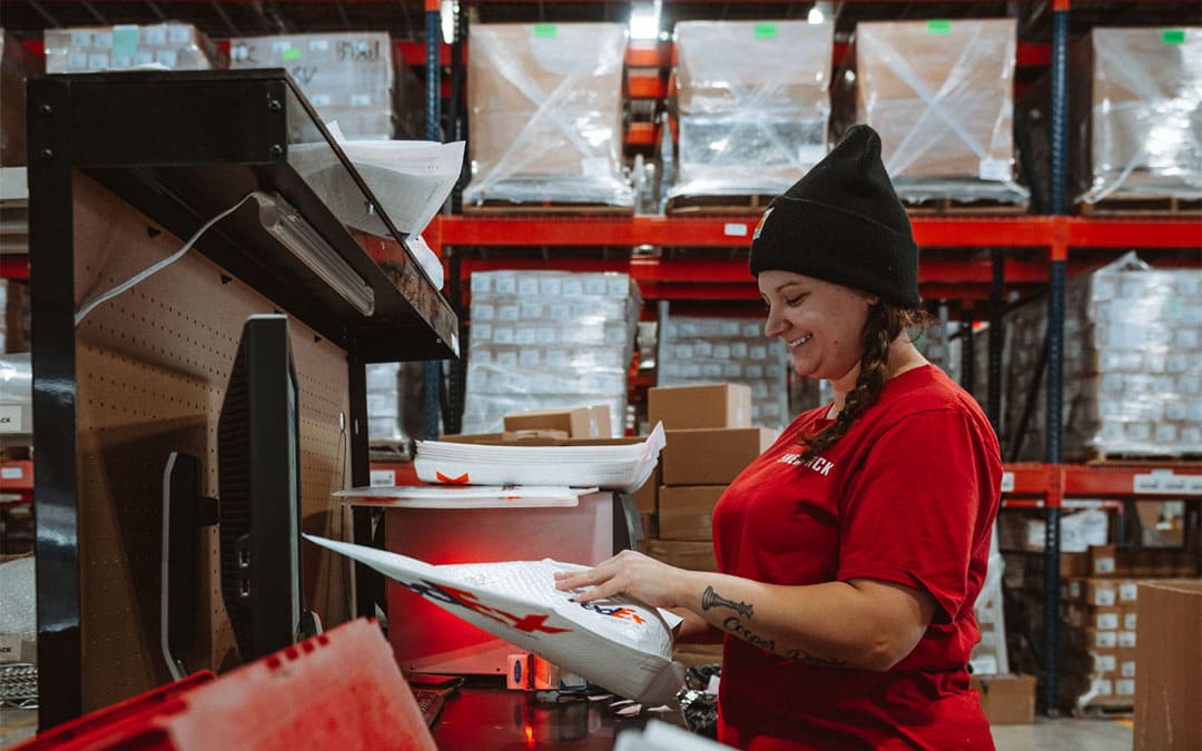 an employee packing orders