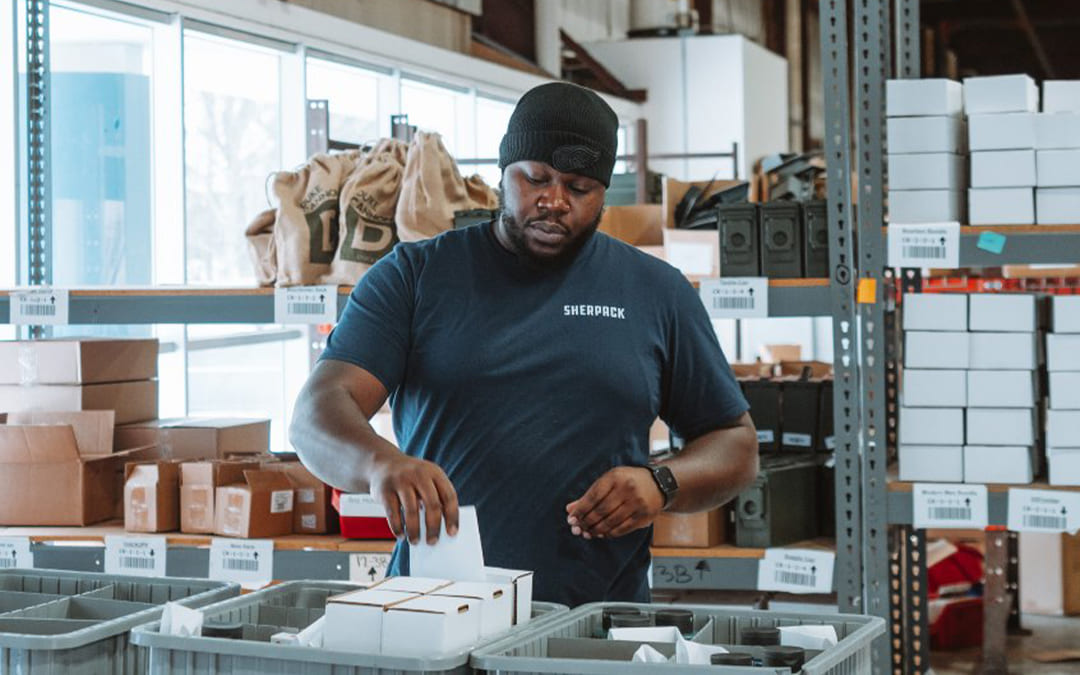 a fulfillment employee packaging EDC products