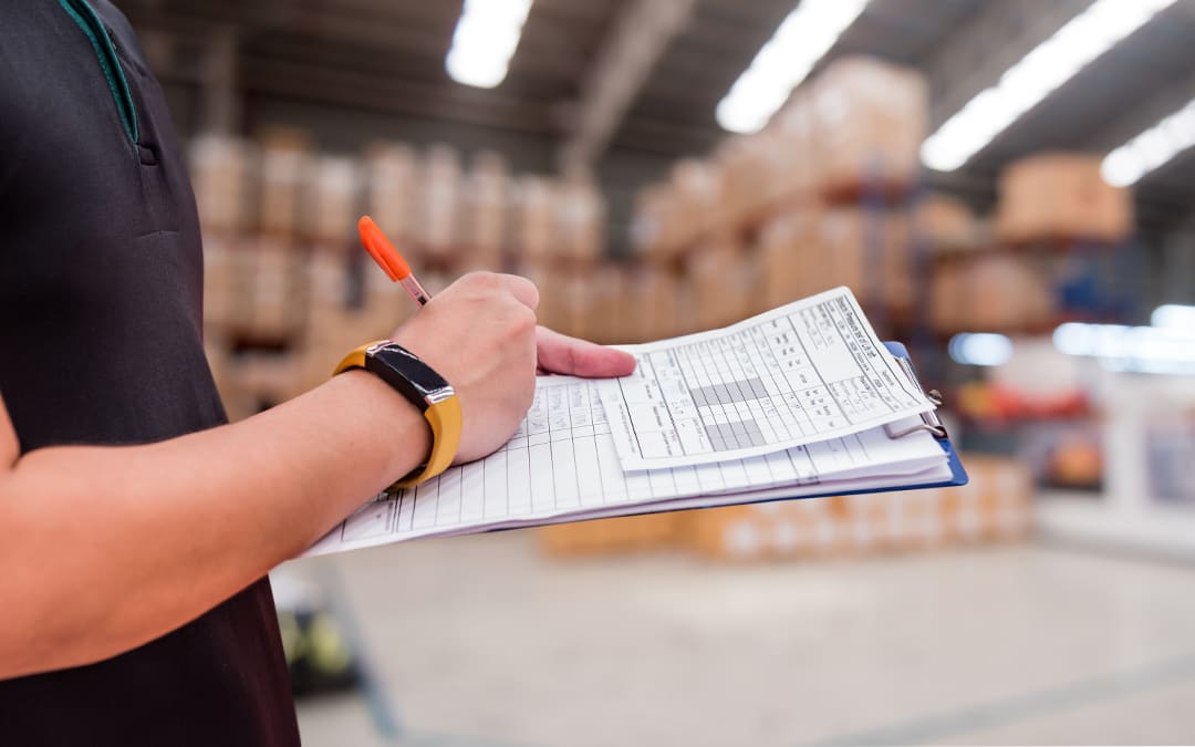 a 3PL employee completing product inspection